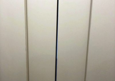 sostituzione porte a battente ascensore con porte automatiche